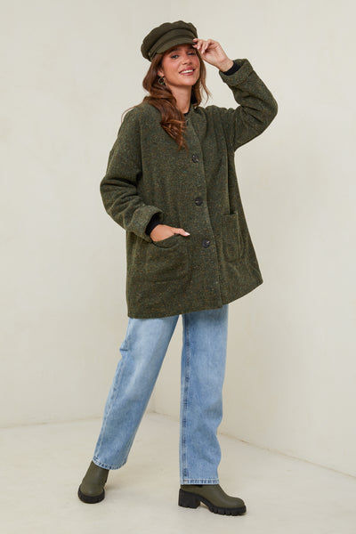 665 Manteau court tissu à motif, col rond fermeture à 4 boutons avec deux poches à l'avant