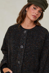 665 Manteau court tissu à motif, col rond fermeture à 4 boutons avec deux poches à l'avant
