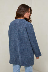 665 Manteau court tissu à motif, col rond fermeture à 4 boutons avec deux poches à l'avant